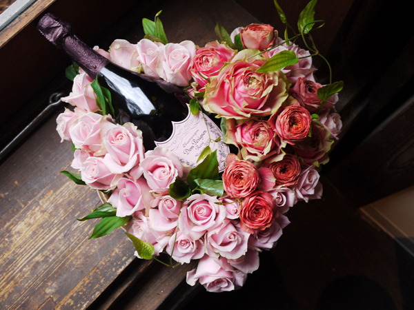 champagne and flower gift